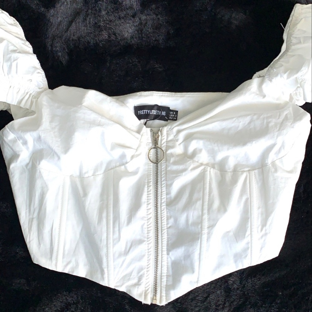 White zip up crop top with ruffle sleeves